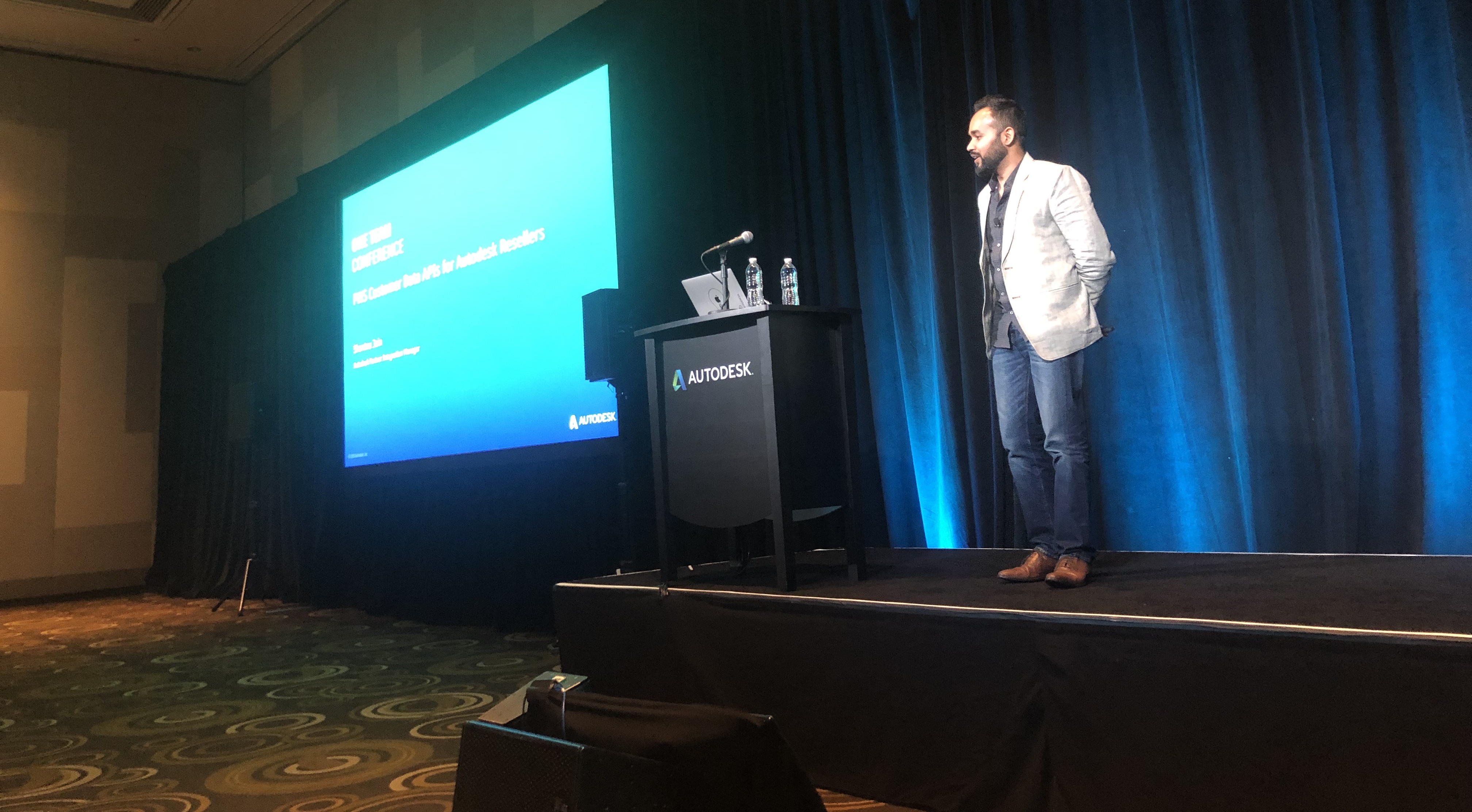 Shantnu Jain delivering a session on stage at the Autodesk partner conference